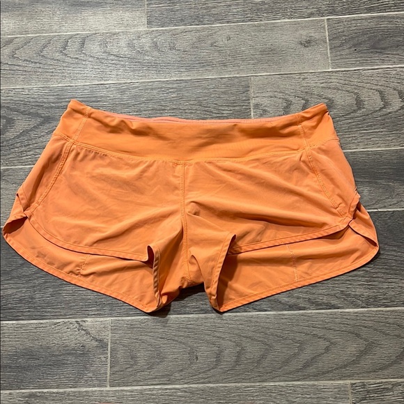 lululemon Speed Up Orange Shorts - Picture 7 of 10